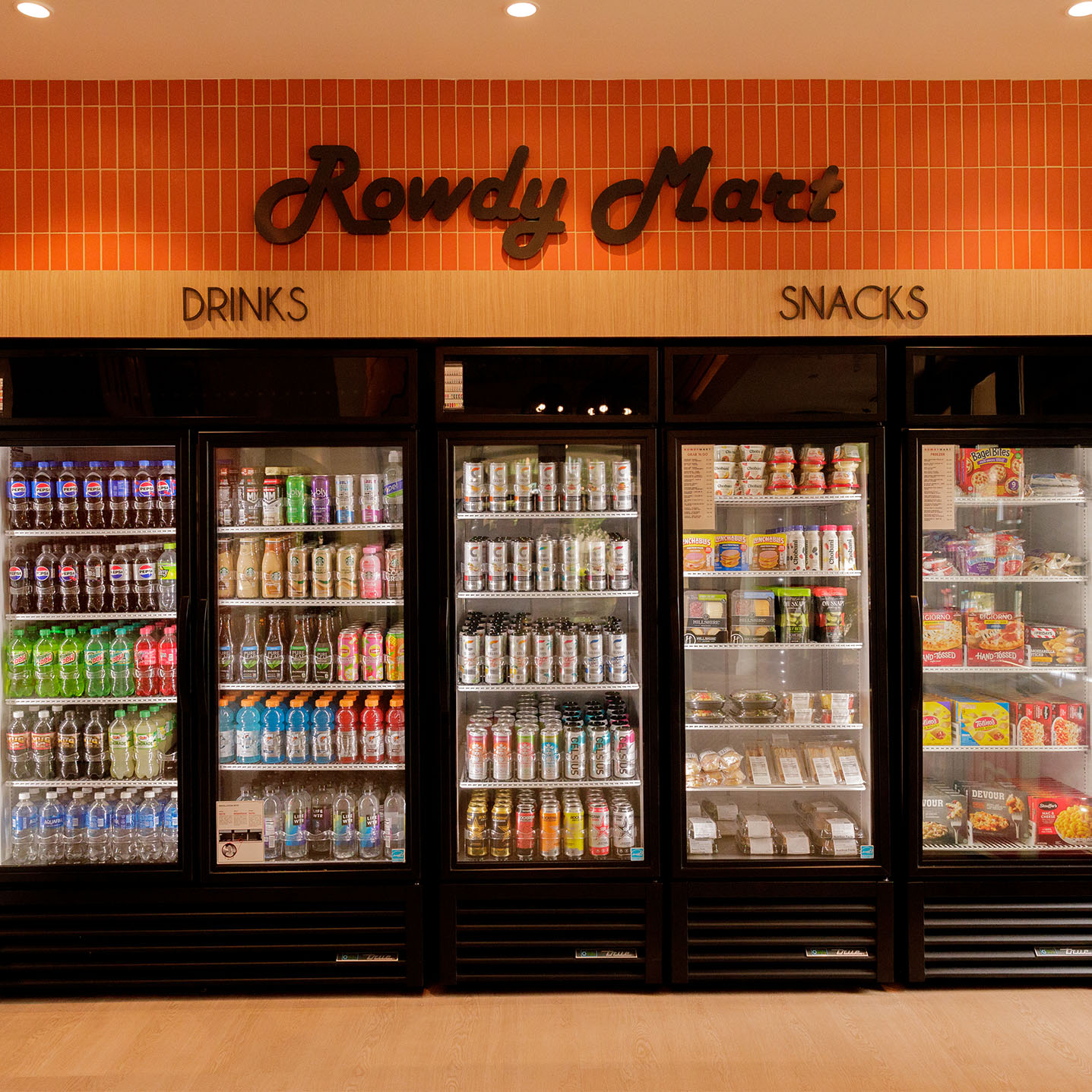 A variety of refrigerated drinks, snacks and frozen meals at a Rowdy Mart location on campus