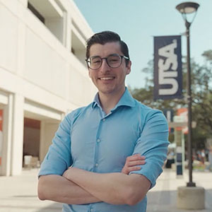 UTSA alumni standing on campus