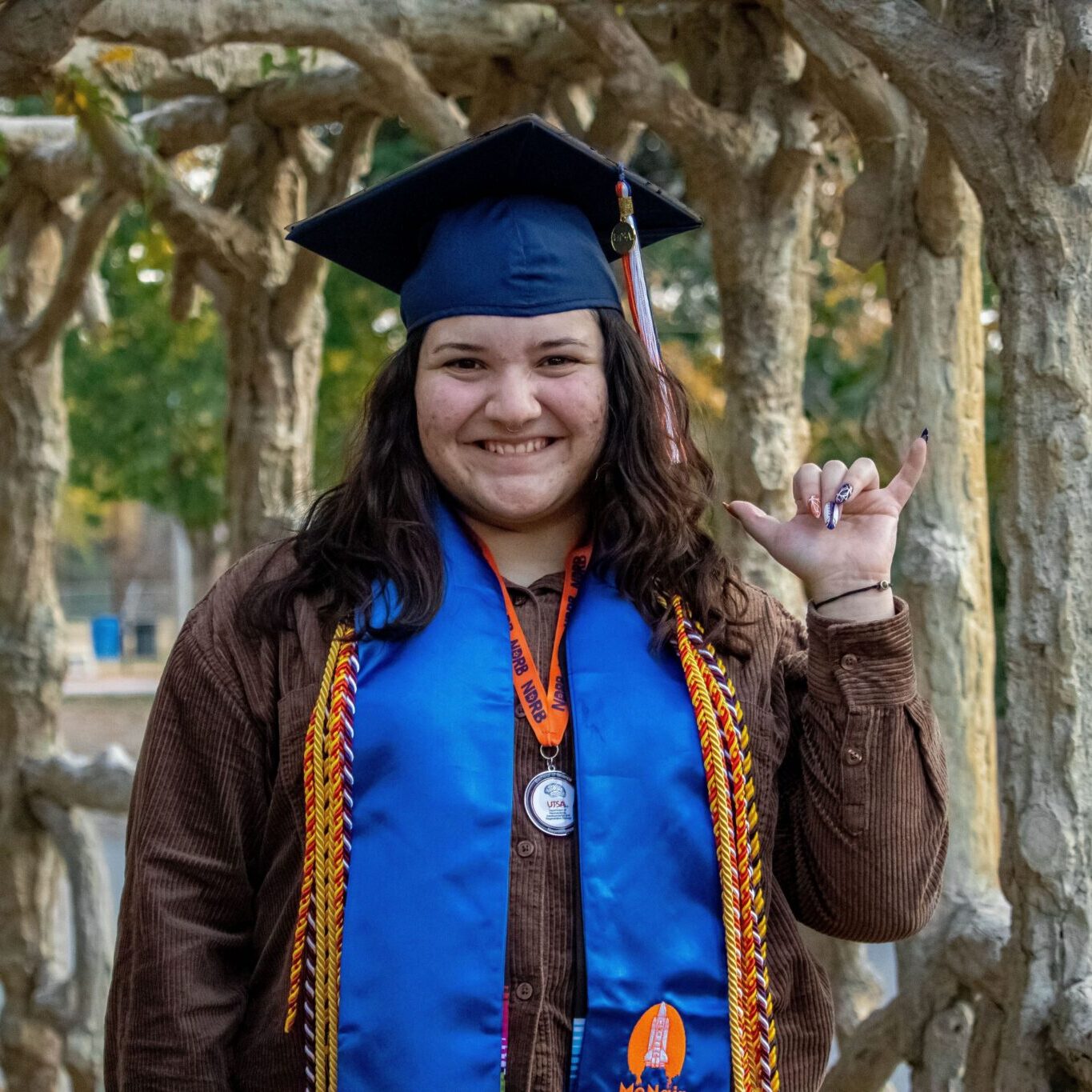 Emily Holder in graduation attire.