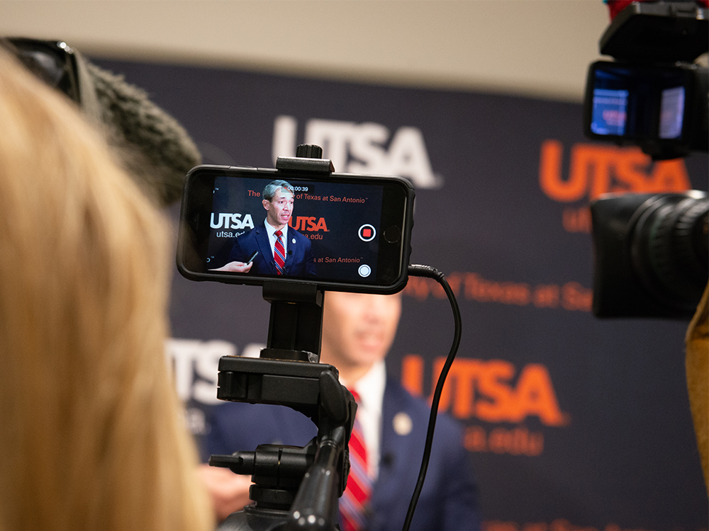 A set of cameras capturing Mayor Ron Nirenberg speaking at UTSA