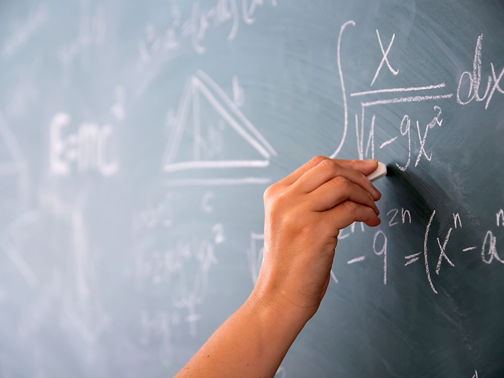 Mathematics problem on a chalk board