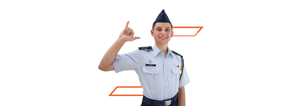 UTSA ROTC student in uniform holding up roadrunner hand sign