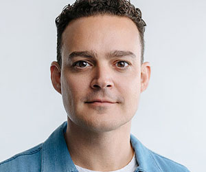Mark Menjivar headshot