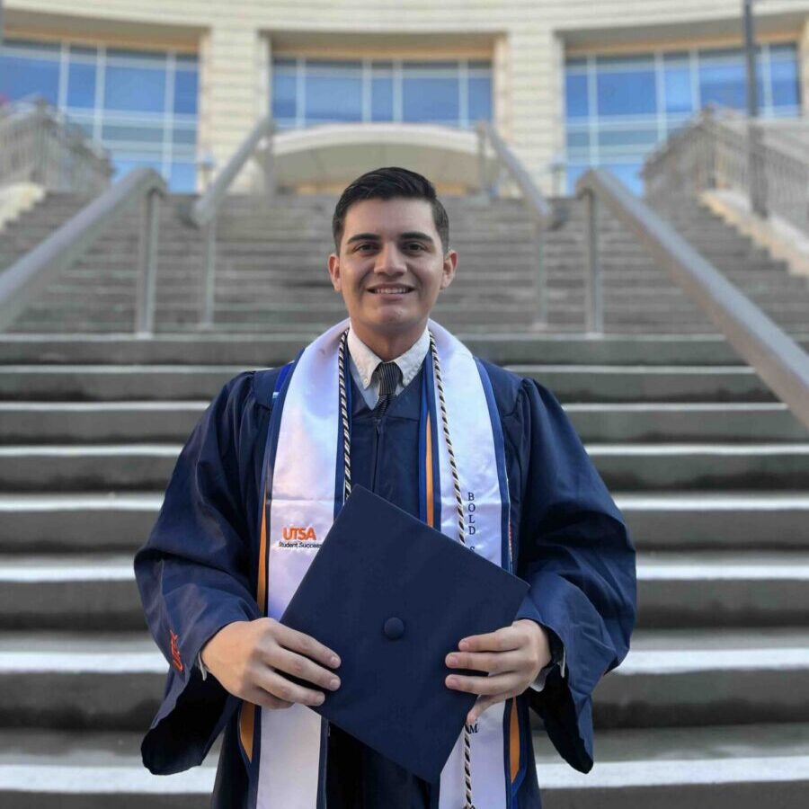 Anthony Quintero in graduation gown.
