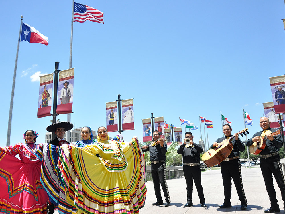 spanish dancers and musicians perform outdoors