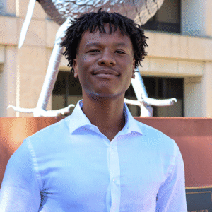 Fred Thompson in front of Rowdy statue.