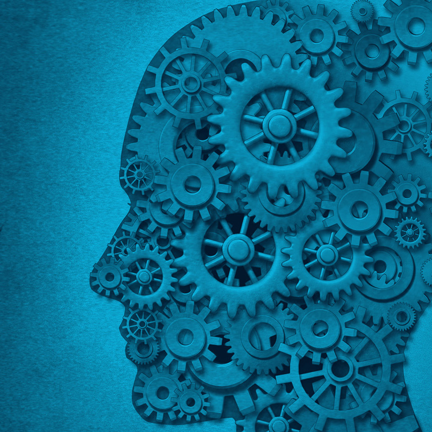 a silhouette of a head filled with gears